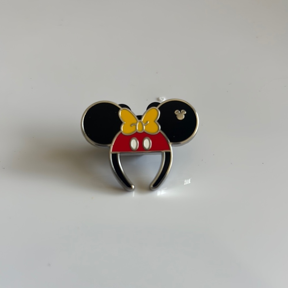 2025 Hidden Disney Pin featuring a Mickey and Minnie Mouse Ear Headband.